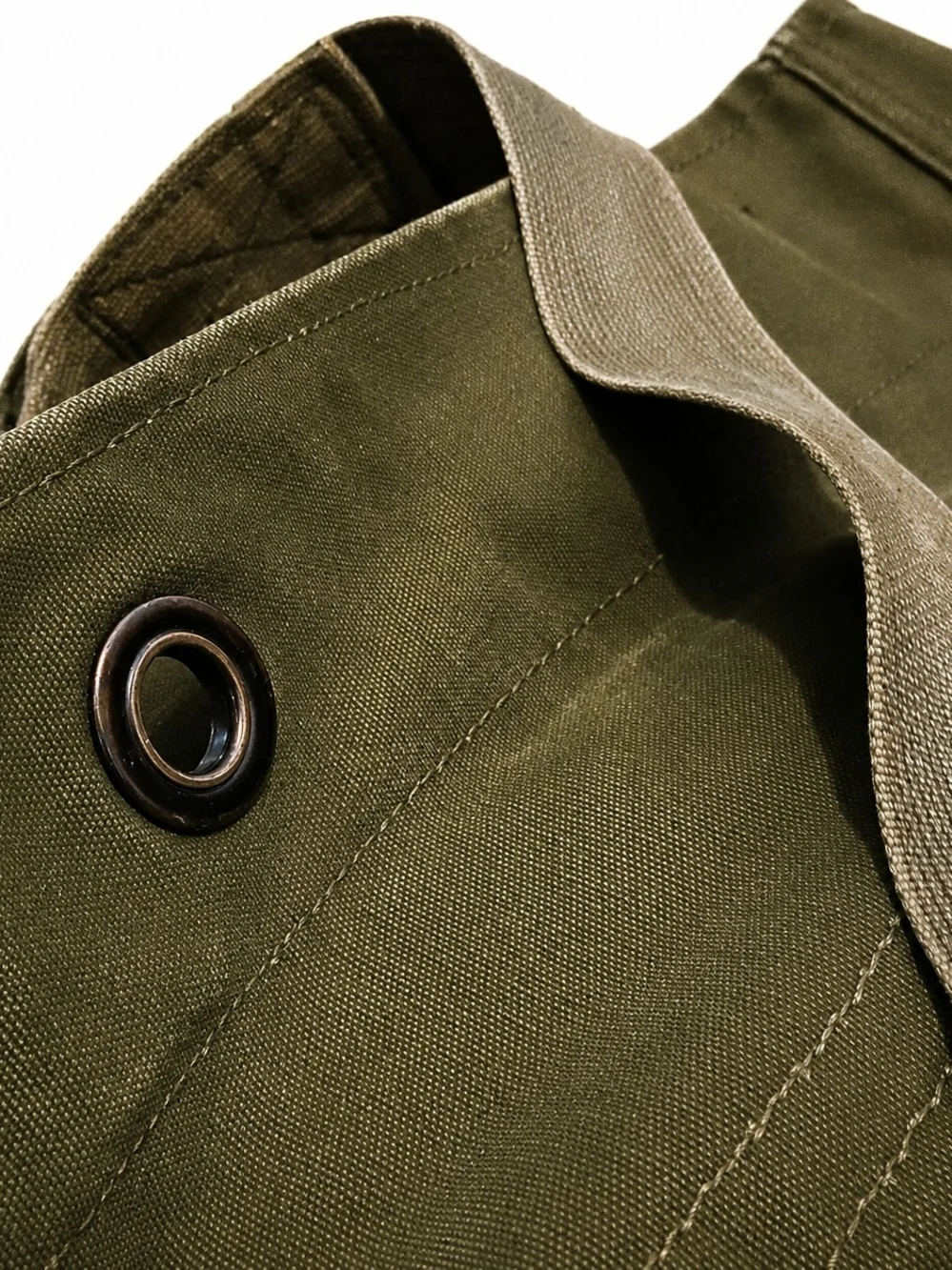 Vintage olive green canvas duffle bag